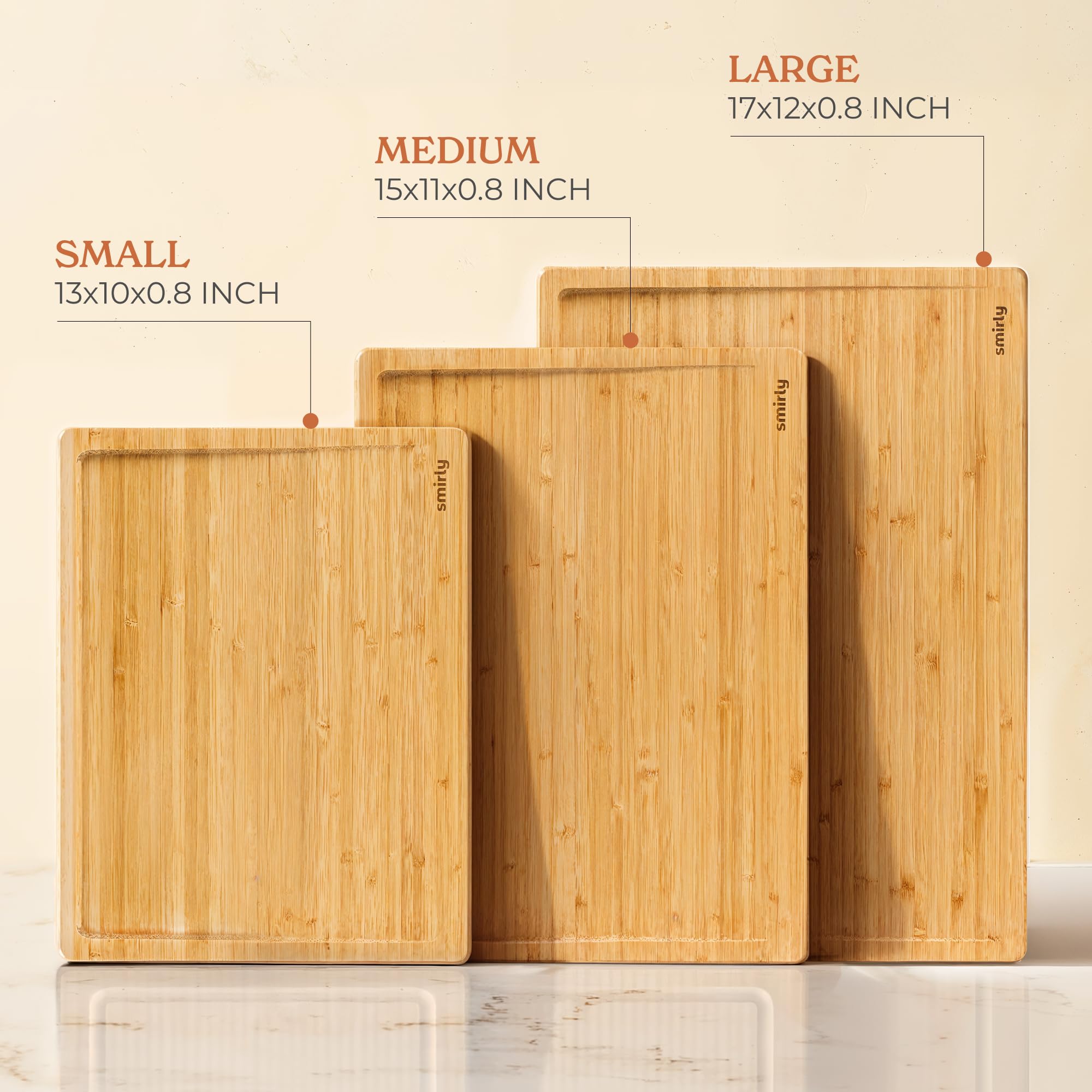 SMIRLY bamboo cutting board with ergonomic handles for a firm, comfortable grip