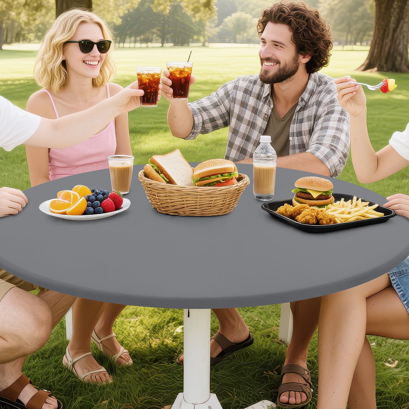 Grey picnic table cover for round tables in outdoor setups.