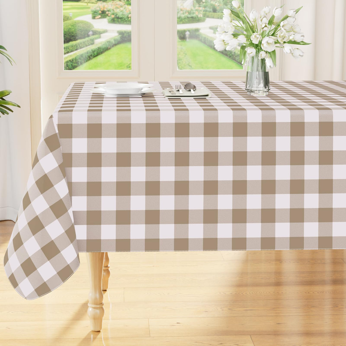 Smiry rectangle table cloth with waterproof vinyl surface protects the table.