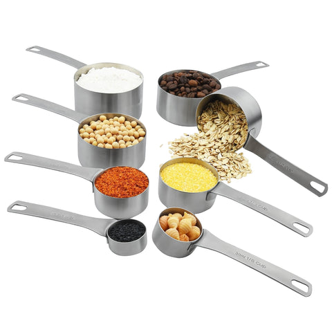 Smithcraft measuring spoons and cups in varied sizes for precise ingredient measures.