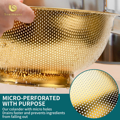 Snailhouse gold 3 Qt colander close-up of perforations for anti-clogging performance.