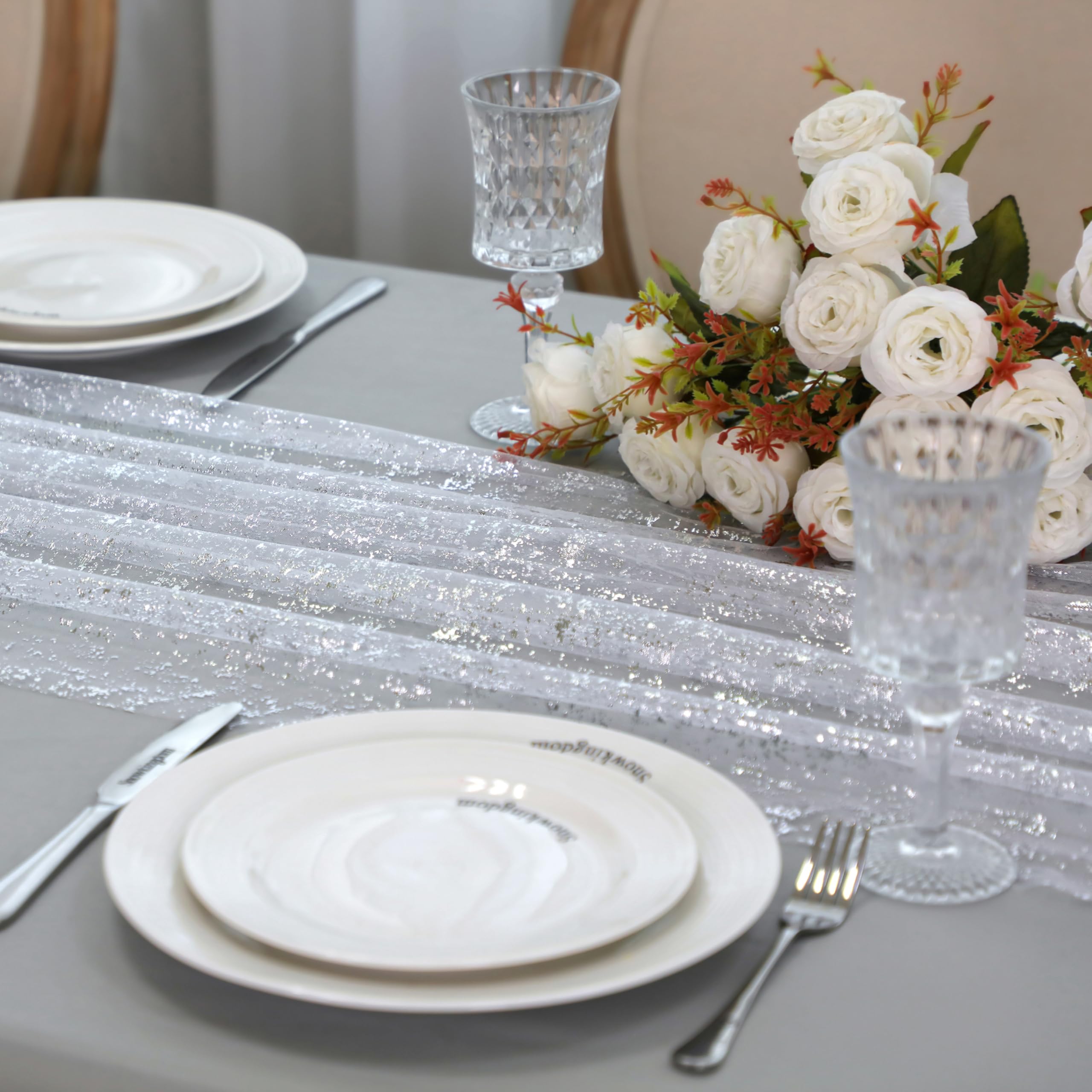 Snowkingdom birthday party decor adds subtle shimmer to tables