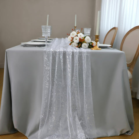 Snowkingdom metallic silver foil runner adds lightweight charm to wedding decor.