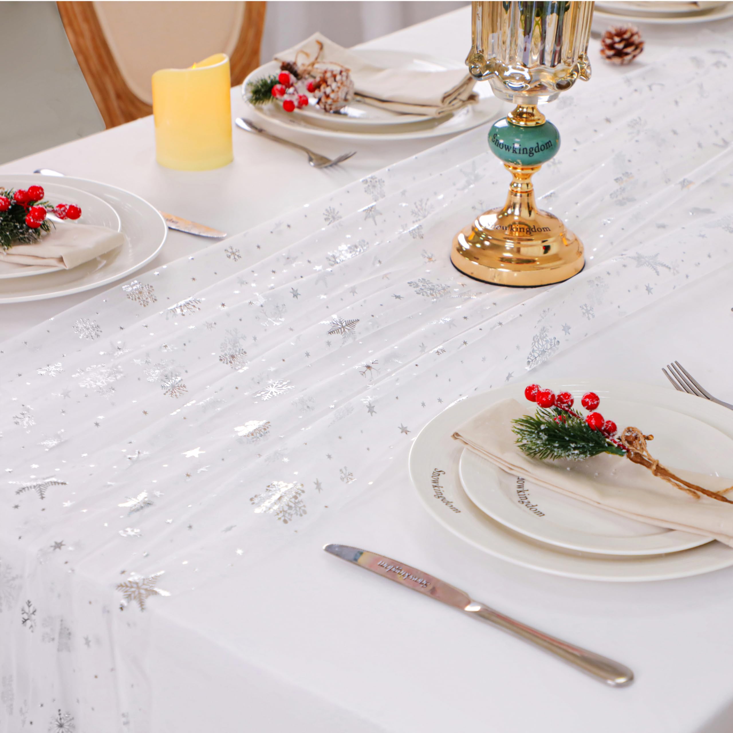 Snowkingdom snowflake table runner adds Christmas dining table sparkle and warmth.