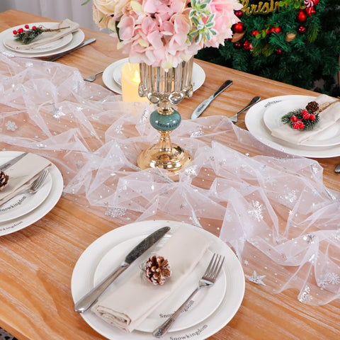 Snowkingdom runner enhances winter party table settings with subtle sparkle.