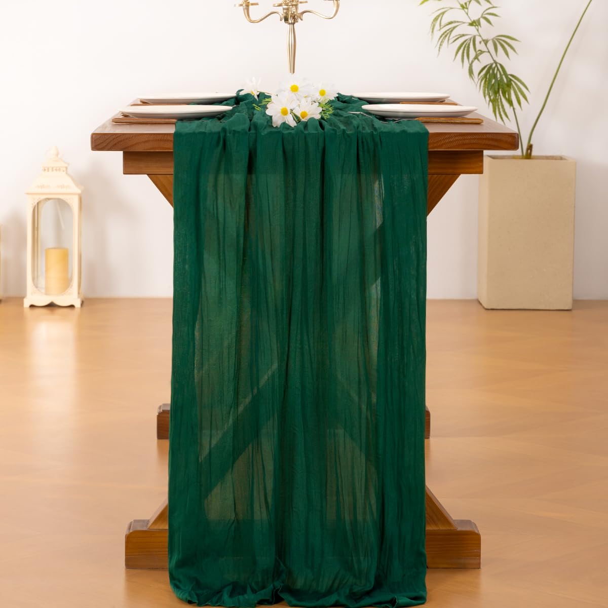 Socomi emerald-green cheesecloth table runner close-up shows soft fabric and hand-dyed finish.