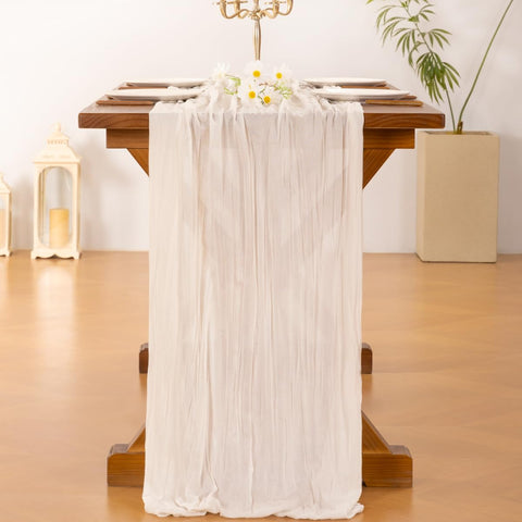 Socomi ivory cheesecloth runner elevates baby shower tables with soft, welcoming texture