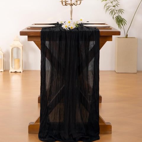 Socomi cheesecloth runner on wedding arch creates elegant backdrop.