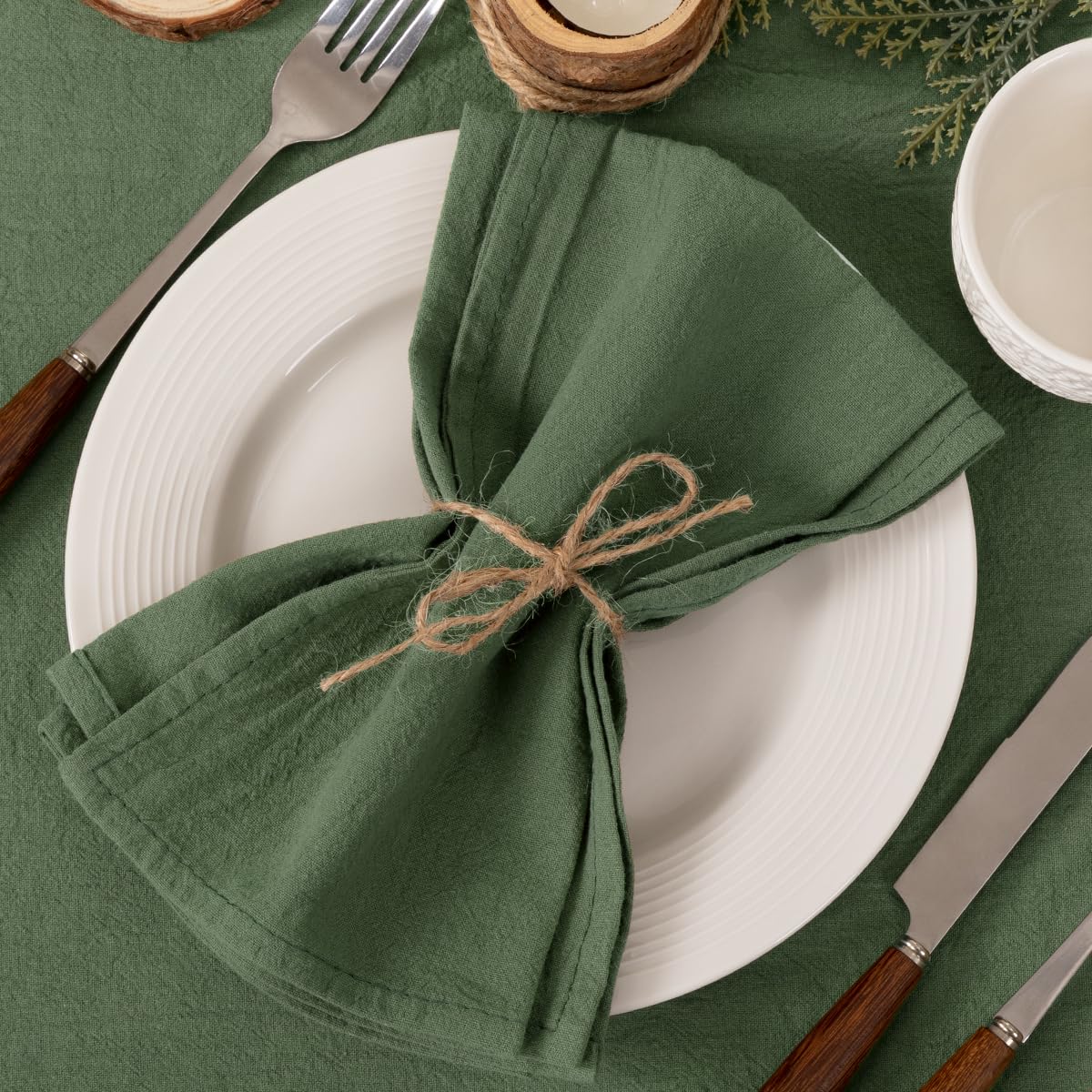 Socomi cloth napkins feature stitched edges for a refined table look.