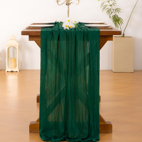 Socomi emerald runner used as arch decor at a rustic wedding