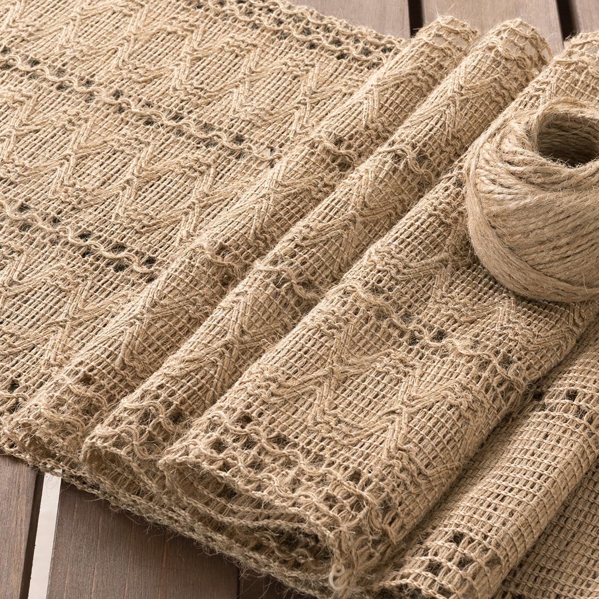 Socomi macrame-fringed table runner adds textured boho elegance.