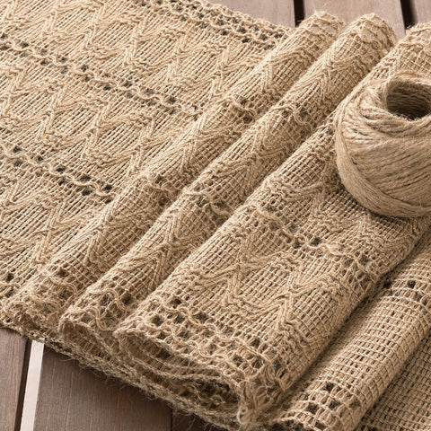 Socomi macrame-fringed table runner adds textured boho elegance.