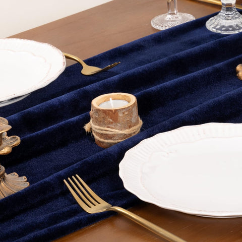 Socomi navy blue velvet table runner laid out for Christmas or Thanksgiving tables.