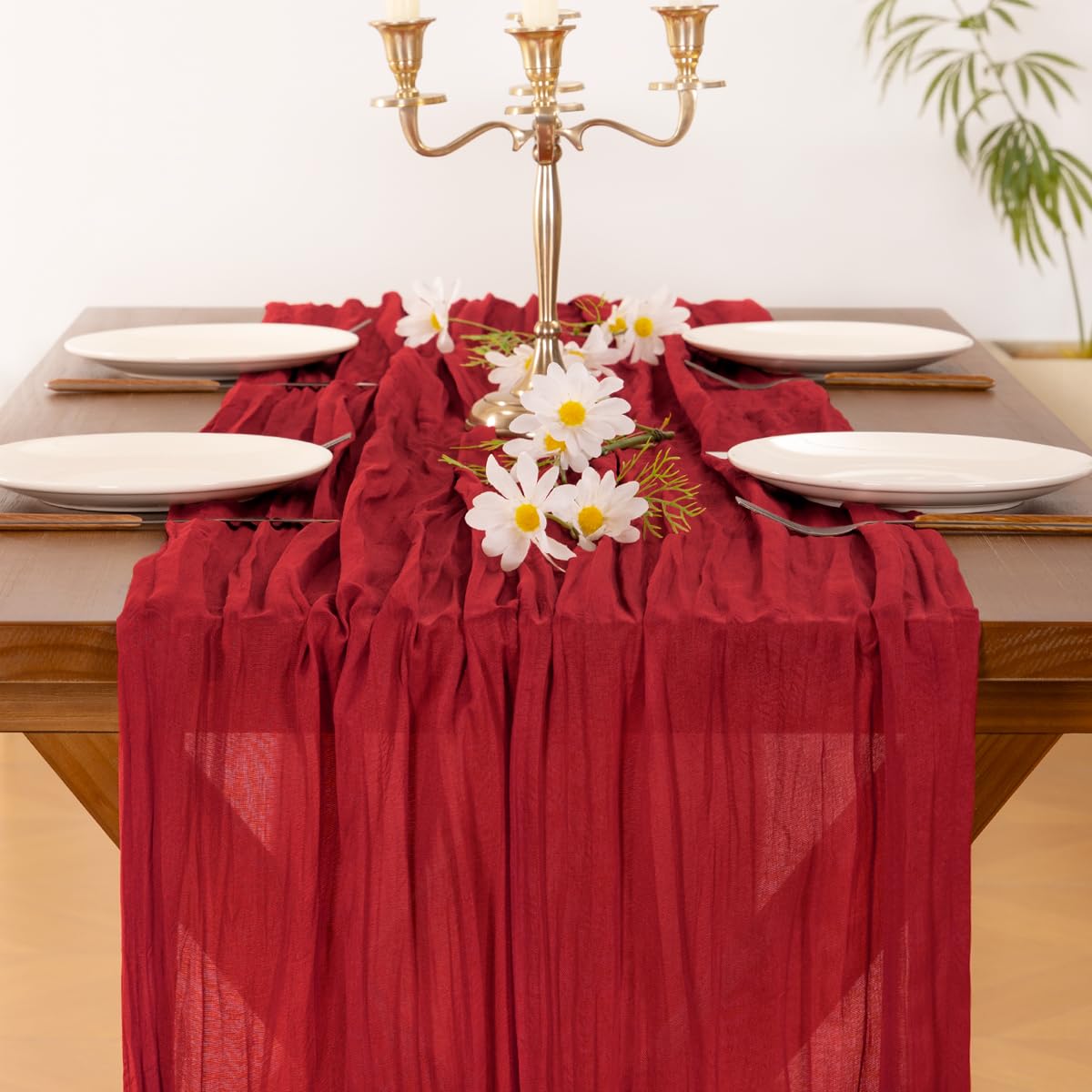Socomi red cheesecloth table runner for baby shower creates soft rustic decor.