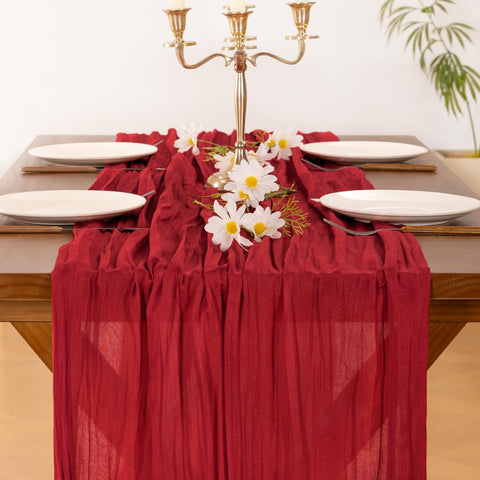 Socomi red cheesecloth table runner for baby shower creates soft rustic decor.