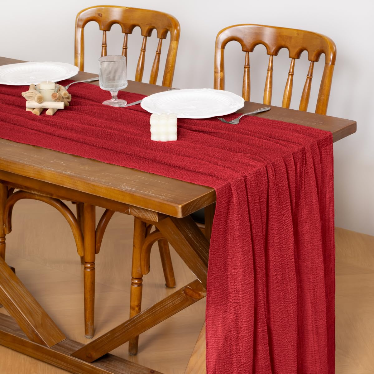 Socomi red cheesecloth table runner on dining table elevating centerpiece