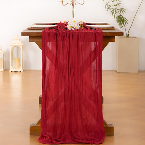 Socomi red cheesecloth table runner for Valentine's Day table setting.