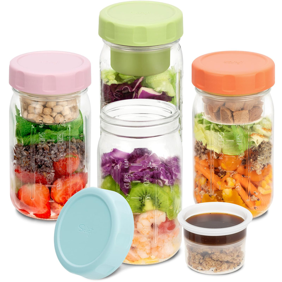 SOLIGT glass salad jar with pink lid showing separated compartments for fresh ingredients.