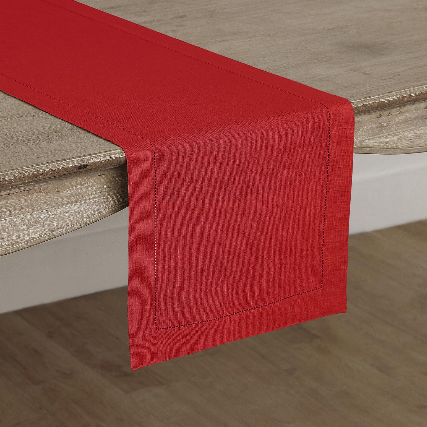 Solino Home red linen runner close-up highlighting texture and artisanal craft.