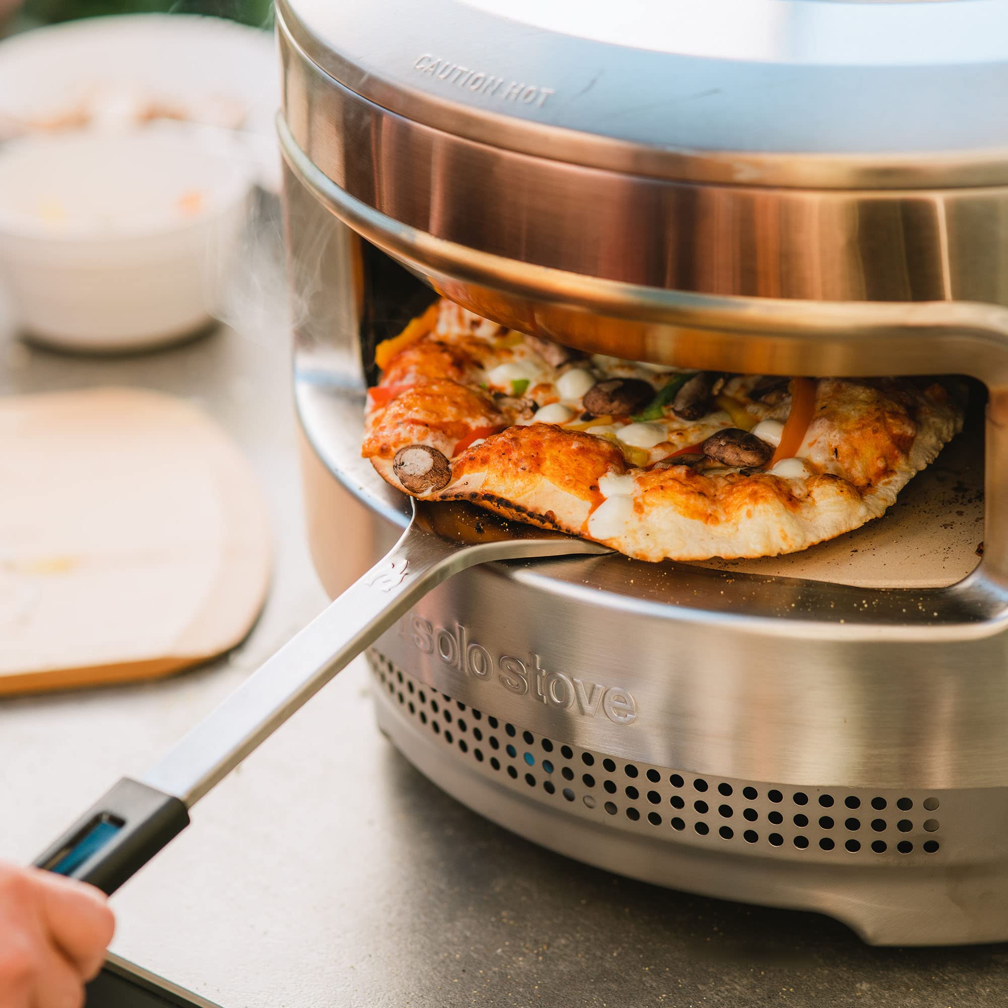 Solo Stove pizza turner comfort-grip handle stays cool during high-heat retrievals