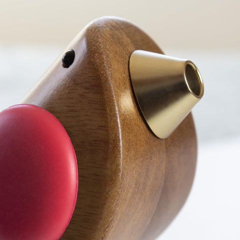 Songbird Specialties pourer can dispense wine, liquor, oil, juice, and more.