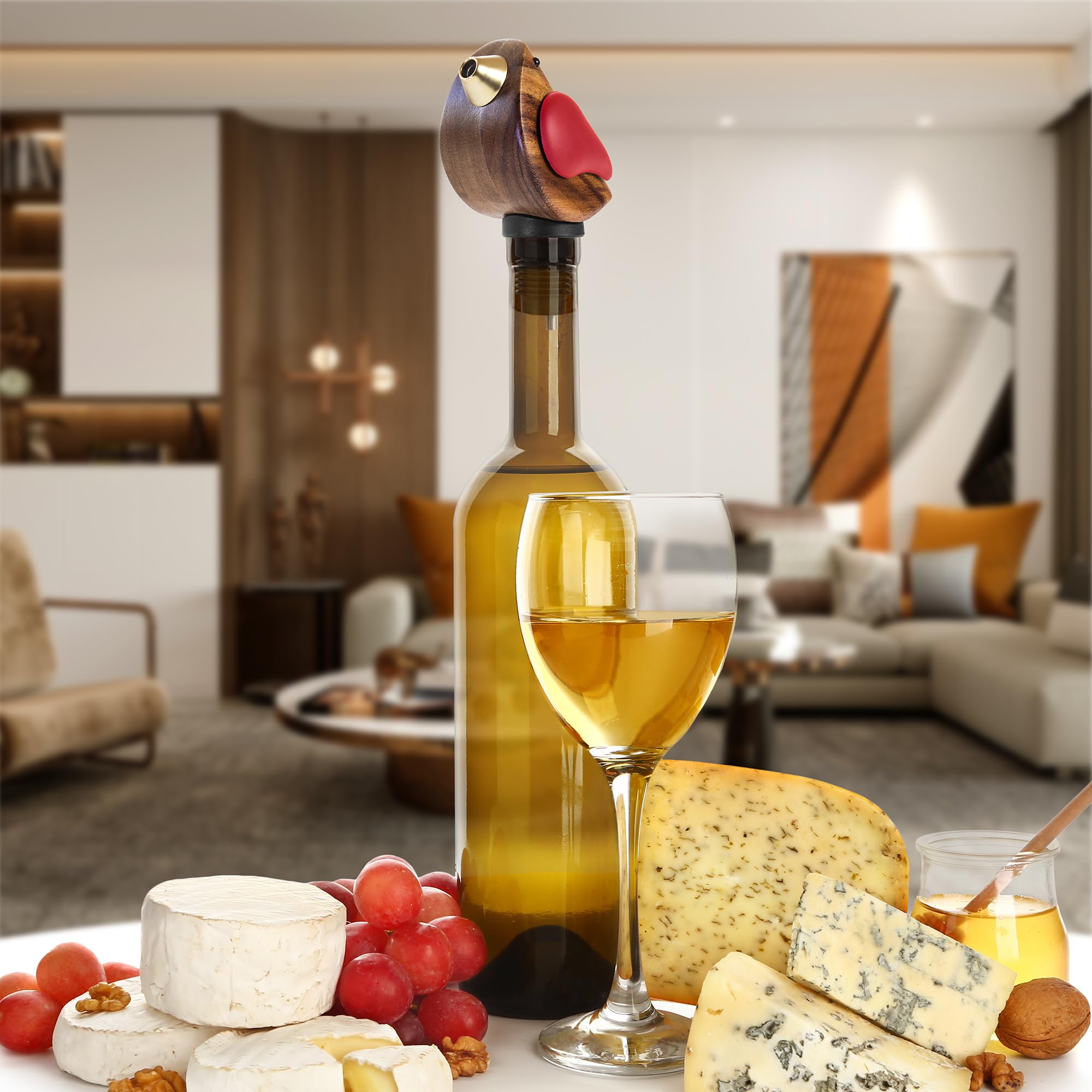 Songbird Specialties pourer designed for red and white wine with minimal spills.