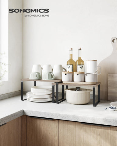 Songmics kitchen spice rack stackable in ink black keeps jars visible and accessible.