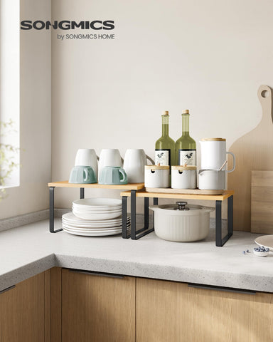 Songmics stackable kitchen shelves demonstrate space-saving configuration for pantry or cabinet reorganization.