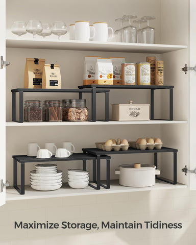 Songmics sturdy shelf in ink black supports heavy jars and cans
