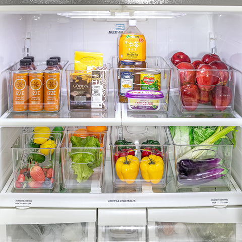Sorbus clear storage bin in fridge for organized items.