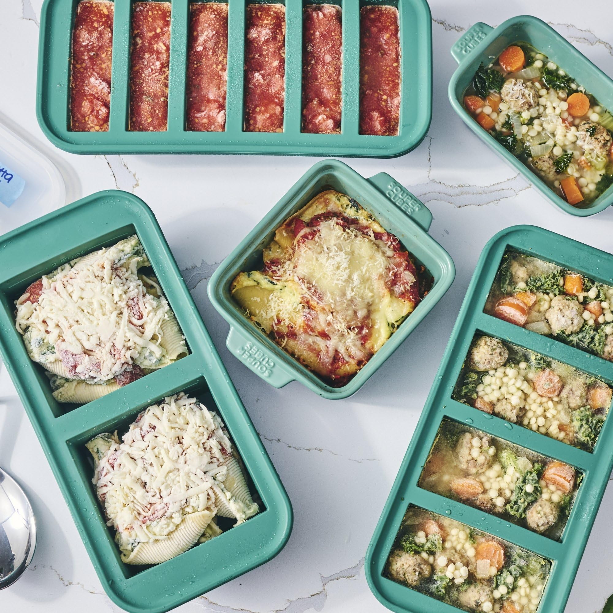 Souper Cubes kale dishwasher-safe tray stack for easy storage.