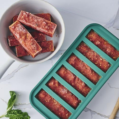 Souper Cubes kale freezer mold open to show fill lines for portion control