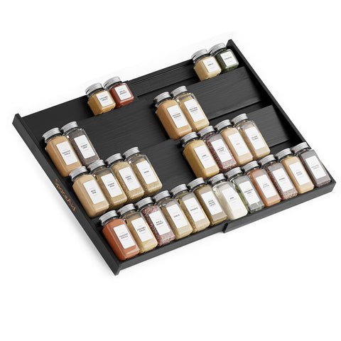 SpaceAid bamboo black spice drawer insert extended, showcasing scalable storage for jars.