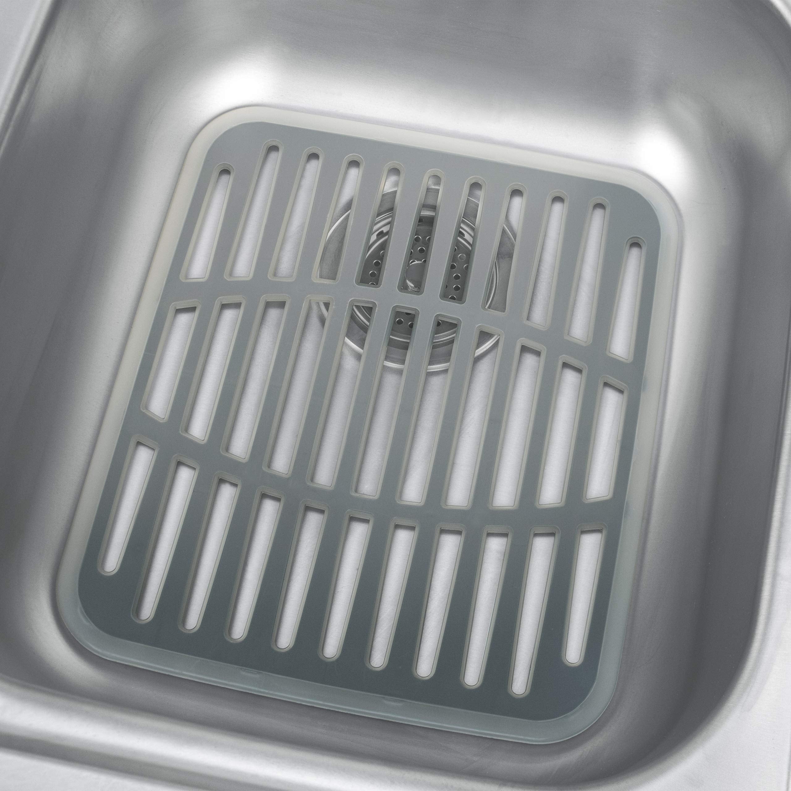Spectrum Cora mat protects dishes and sink surfaces during washing.