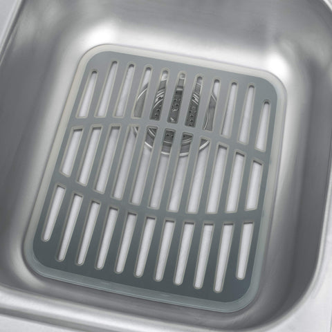 Spectrum Cora mat protects dishes and sink surfaces during washing.