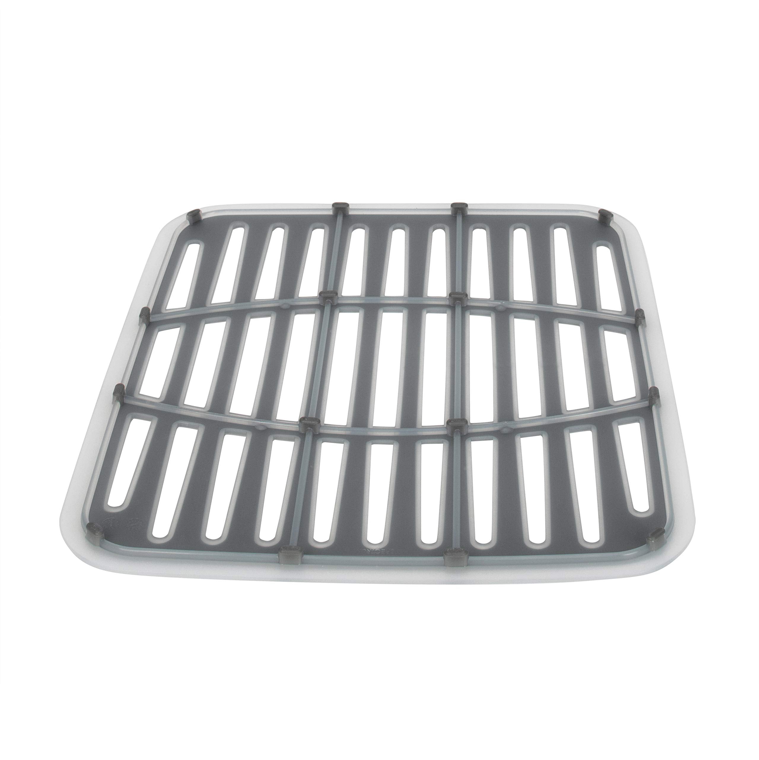 Spectrum Cora mat drains water back into the sink for faster drying.