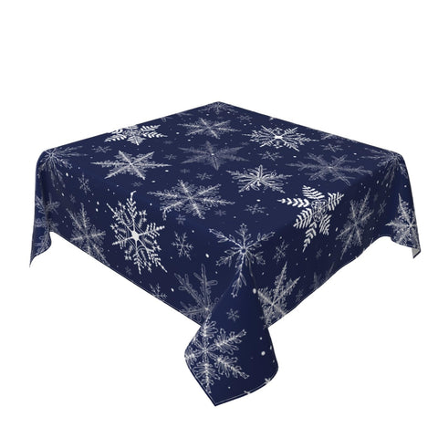 Sphragiyn tablecloth close-up showing blue snowflake design and smooth fabric