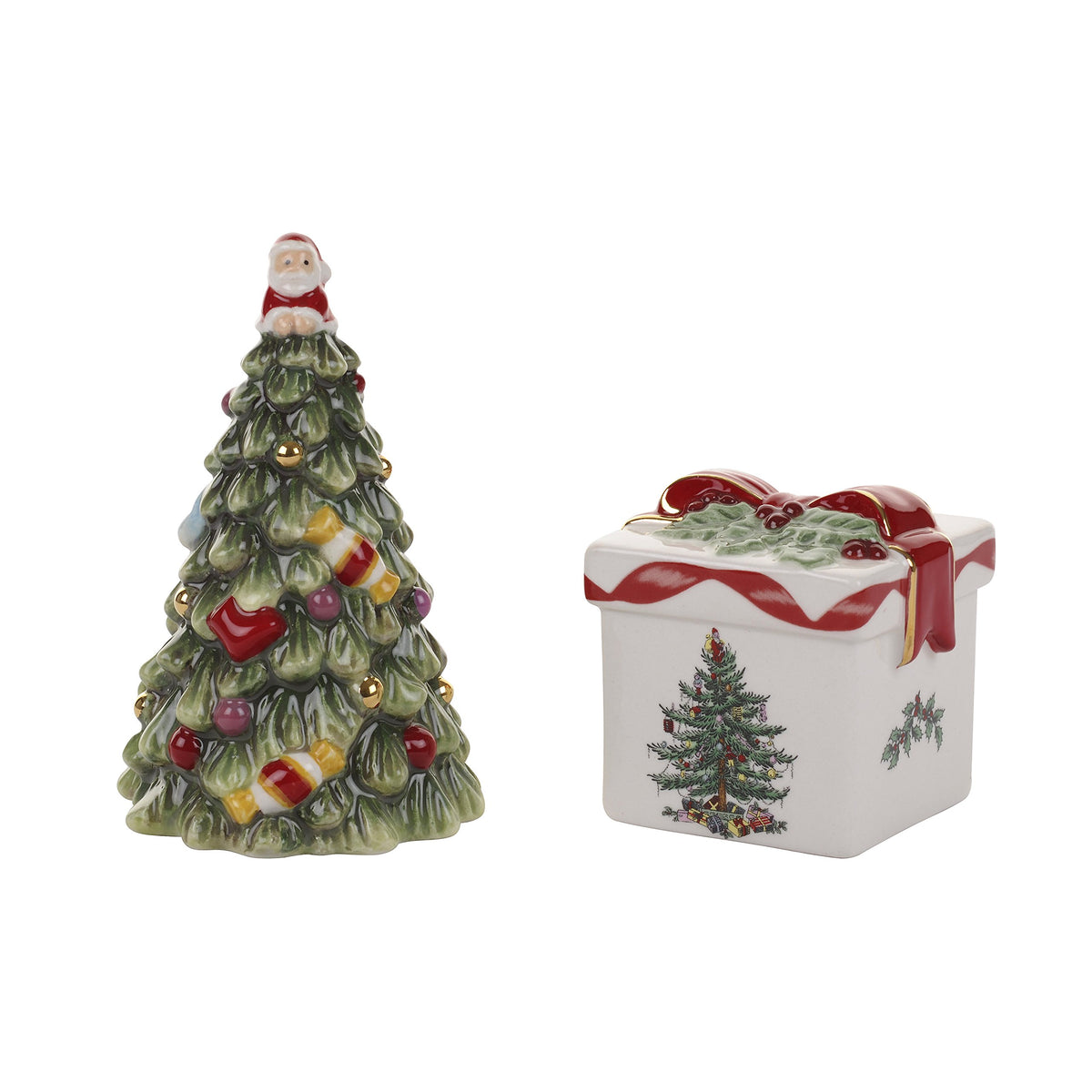 Spode Christmas Tree salt shaker on a gold-edged tree adds festive table charm.