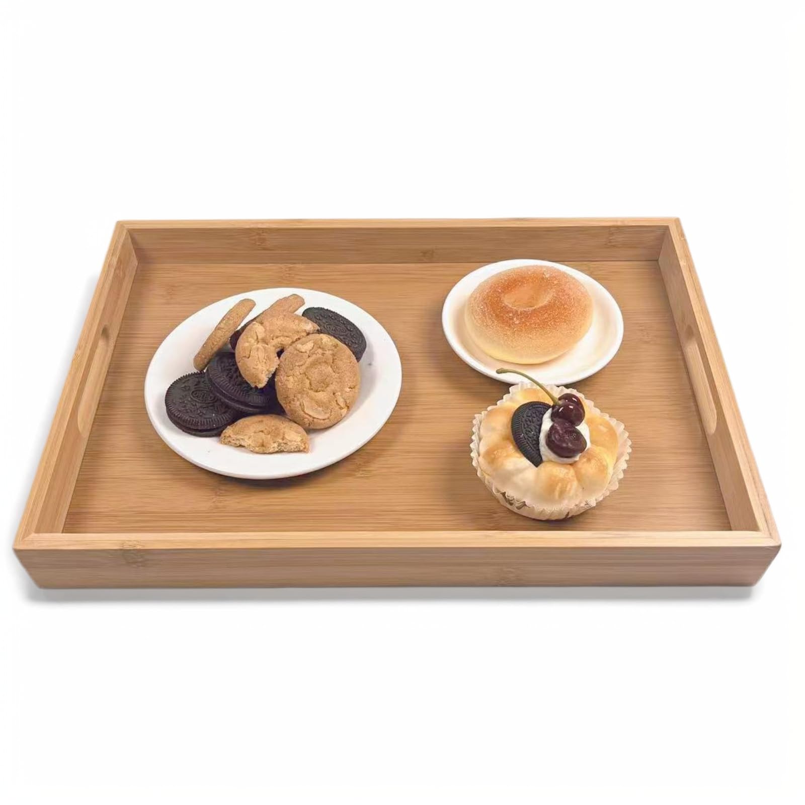 Sprieny bamboo tray with handles for easy, stable serving.
