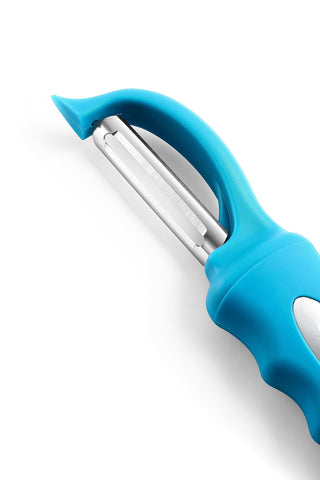 Spring Chef teal swivel peeler in action peeling apples and carrots.