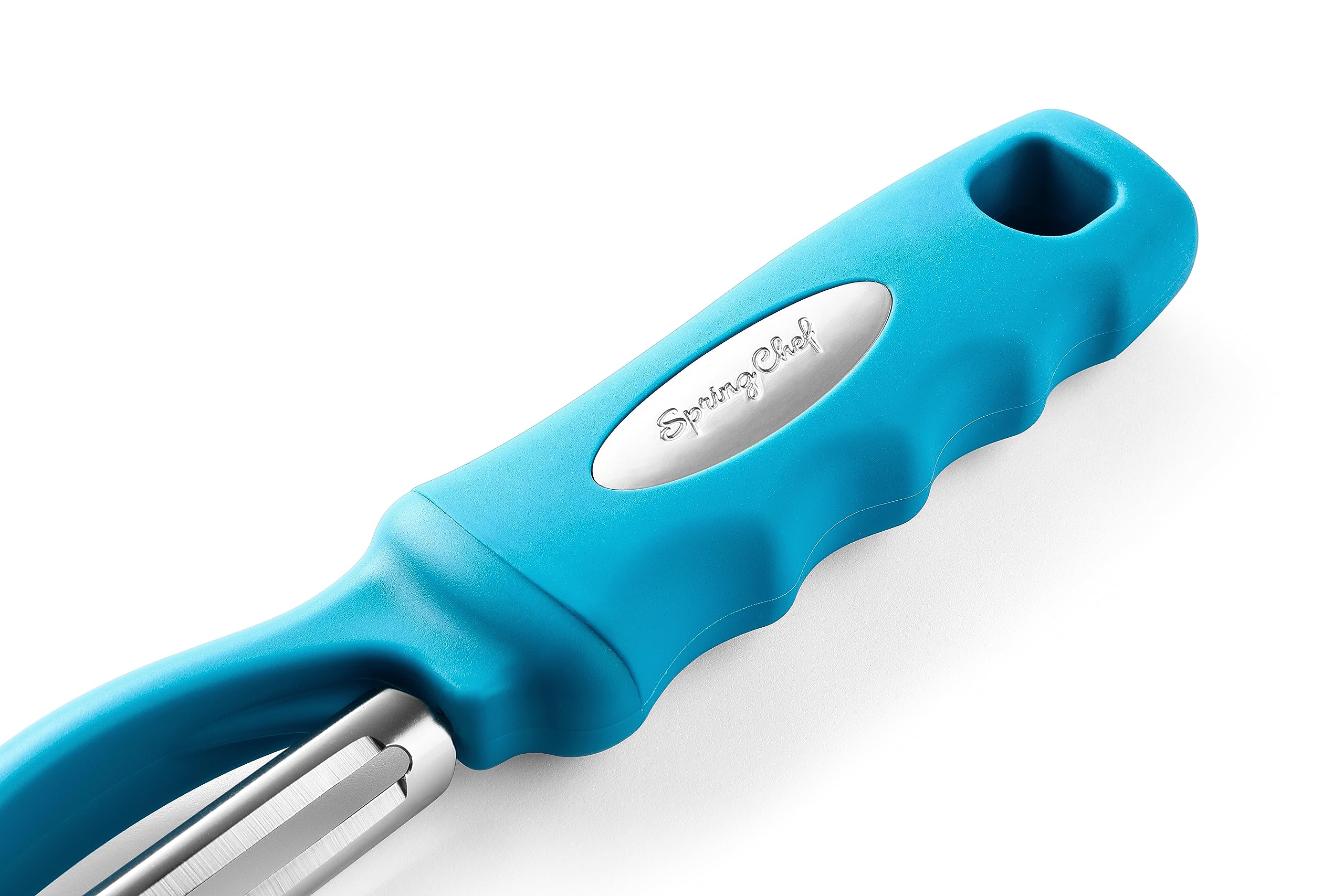 Spring Chef blemish remover feature teal peeler aids accurate prep.