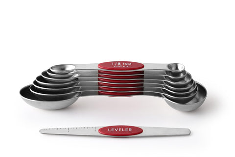 Spring Chef spoons resting on counter top ready to use