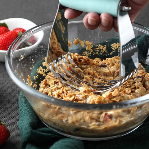 Versatile kitchen tool: chops fruit, nuts, and soft vegetables.