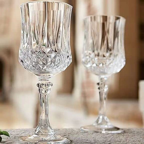 Srgeilzati glasses on a dining table with a glamorous presentation.