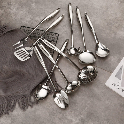 Standcn slotted spatula turner for versatile stirring and lifting.
