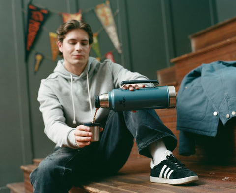 Stanley 24-hour insulation keeps hot or cold drinks on long trips.