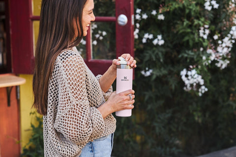 Stanley AeroLight Transit Bottle fits car cup holders for on-the-go hydration.