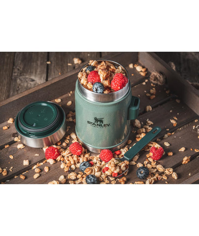 Stanley insulated lid with pressure-release valve for easy opening.