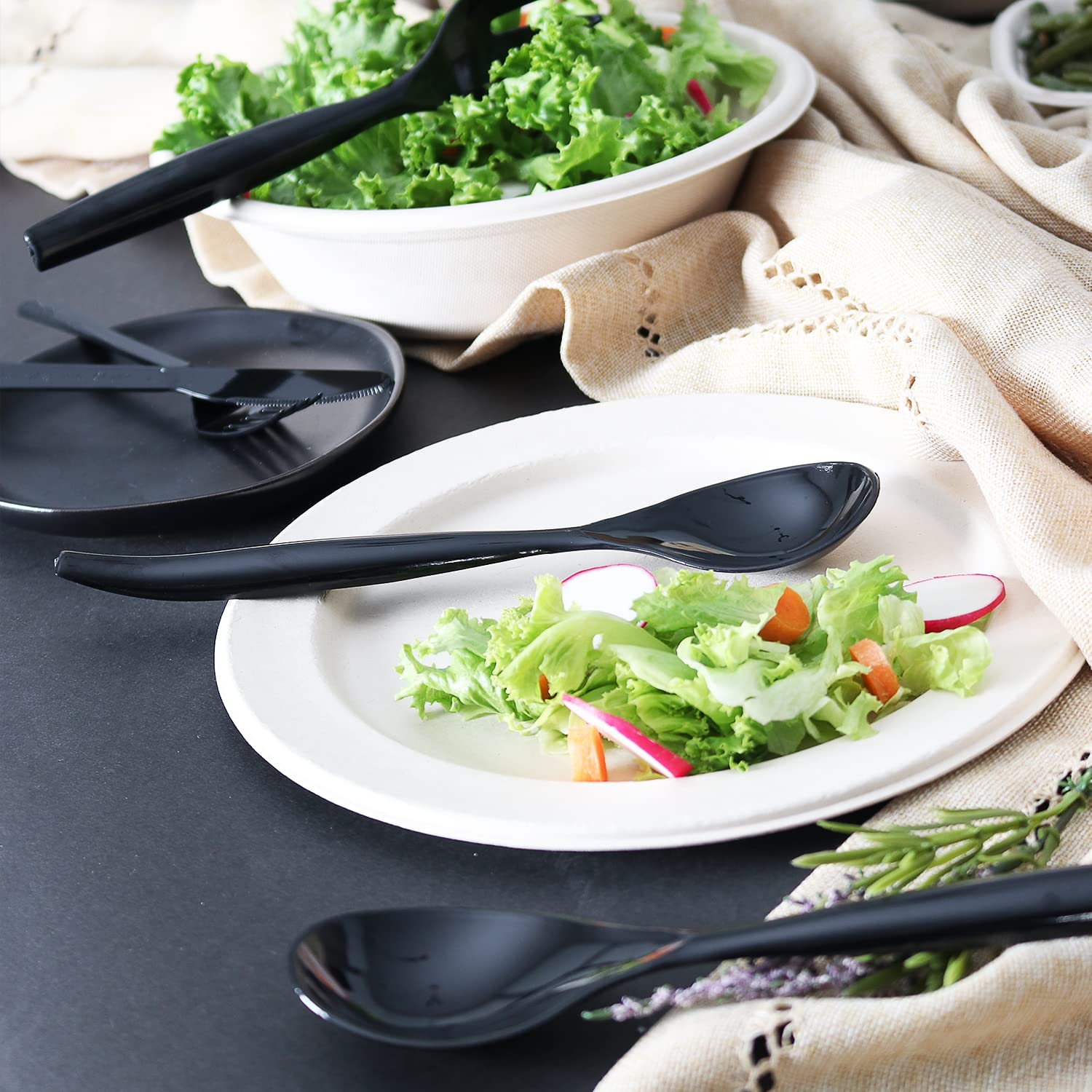 StarMar catering setup featuring black disposable utensils for events.