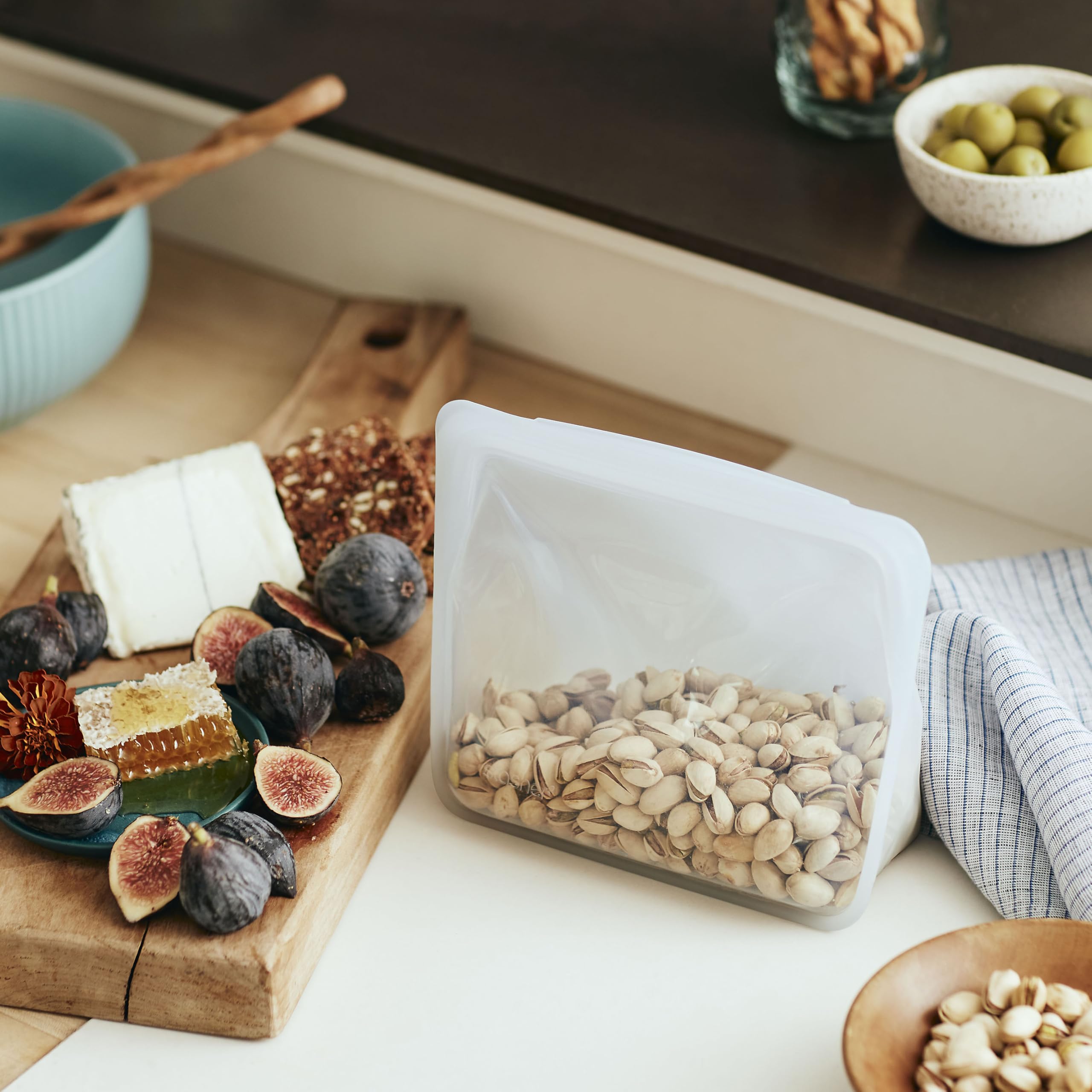 Stasher silicone bag, dishwasher-safe, easy to clean after meals.